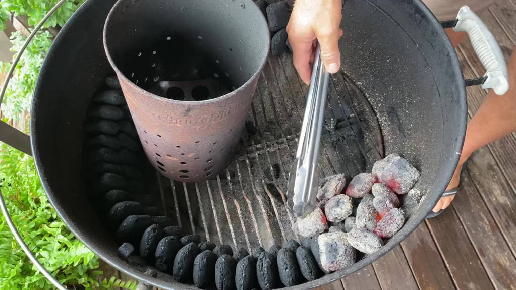 lighting the charcoal with the chimney starter
