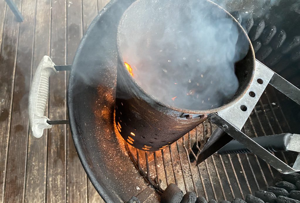 lighting the charcoal chimney