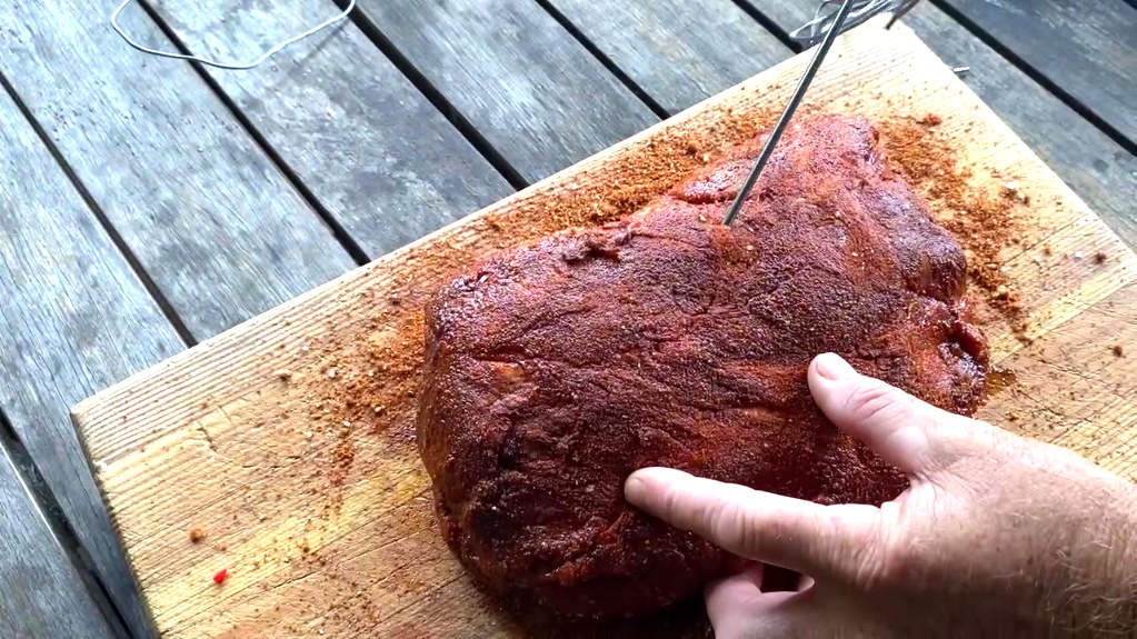 inserting the meat probe for the thermometer