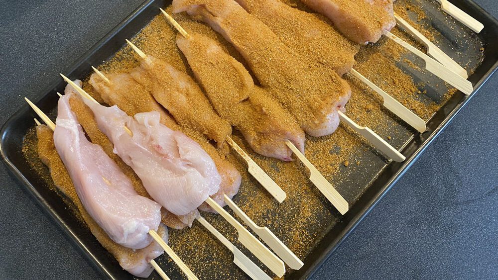 satay chicken sticks coated in spice rub