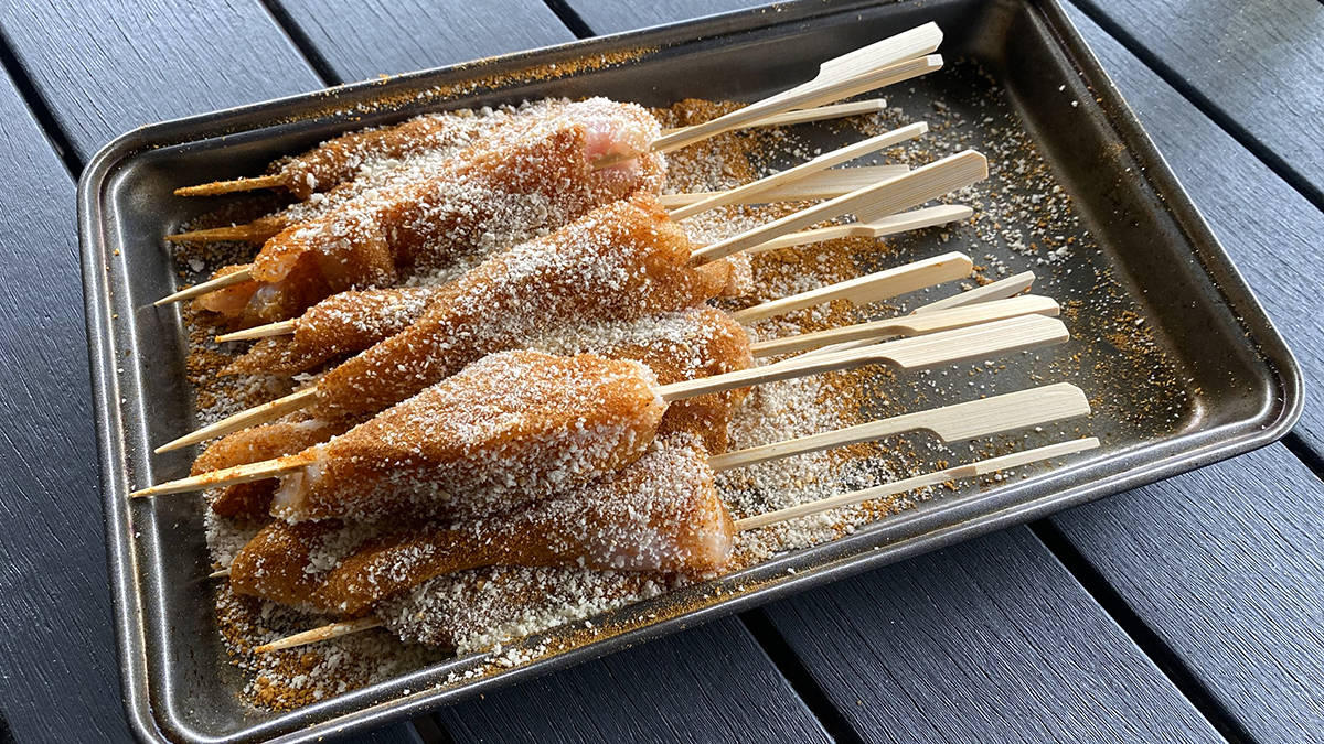 chicken satay sticks coated with rub