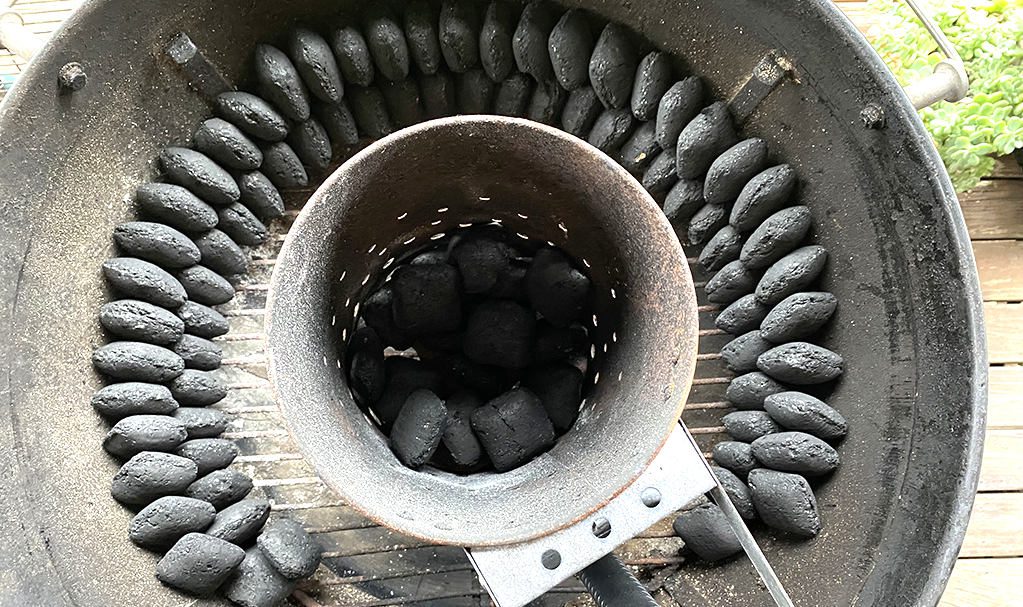 Charcoal beads setup for snake method on Weber charcoal grill