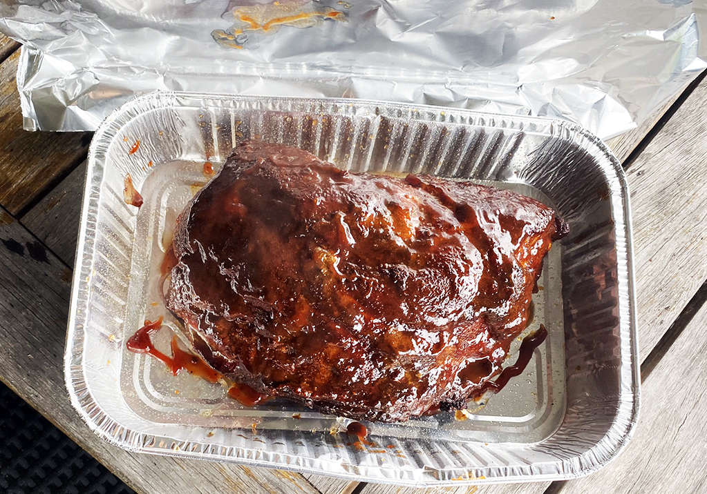 covering the pork with foil after spritzing