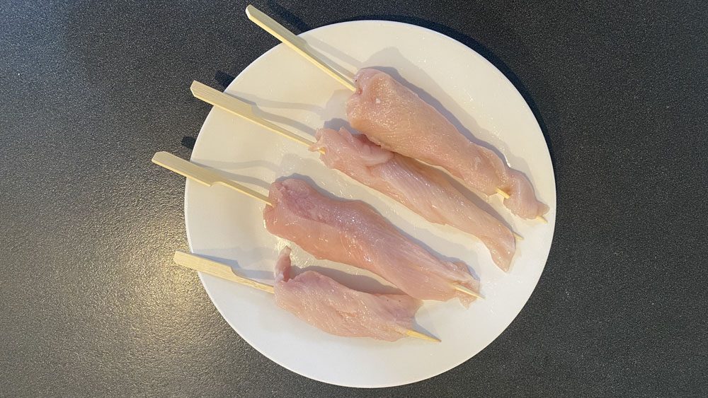 chicken threaded onto skewers