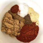 sweet and spicy pork rub consists of a few spices in the bowl